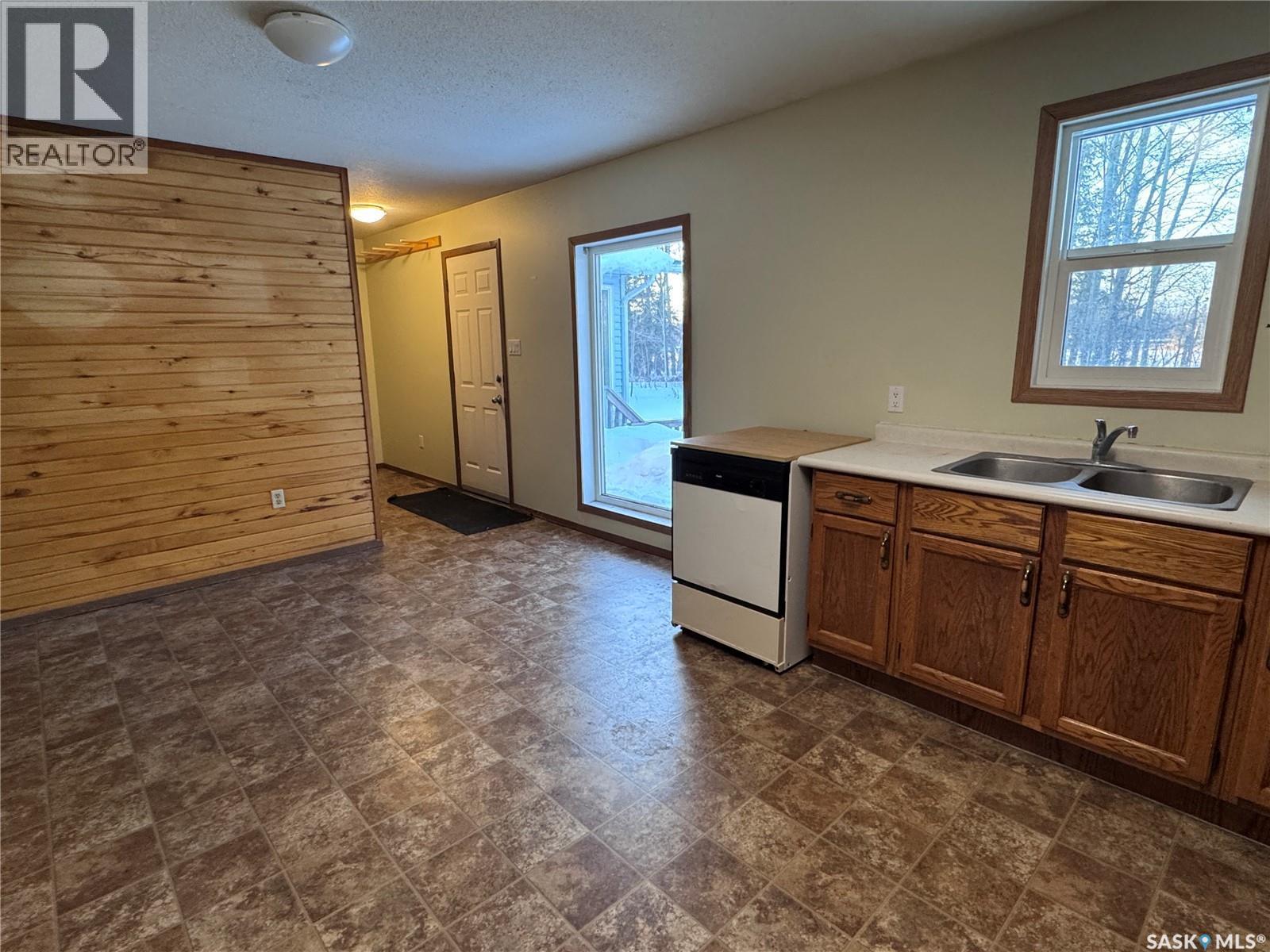 185 Vickers Crescent, Air Ronge, SK - Indoor Photo Showing Kitchen With Double Sink