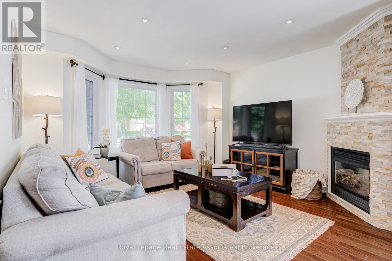 1179 Treetop Terrace, Oakville, ON - Indoor Photo Showing Living Room With Fireplace