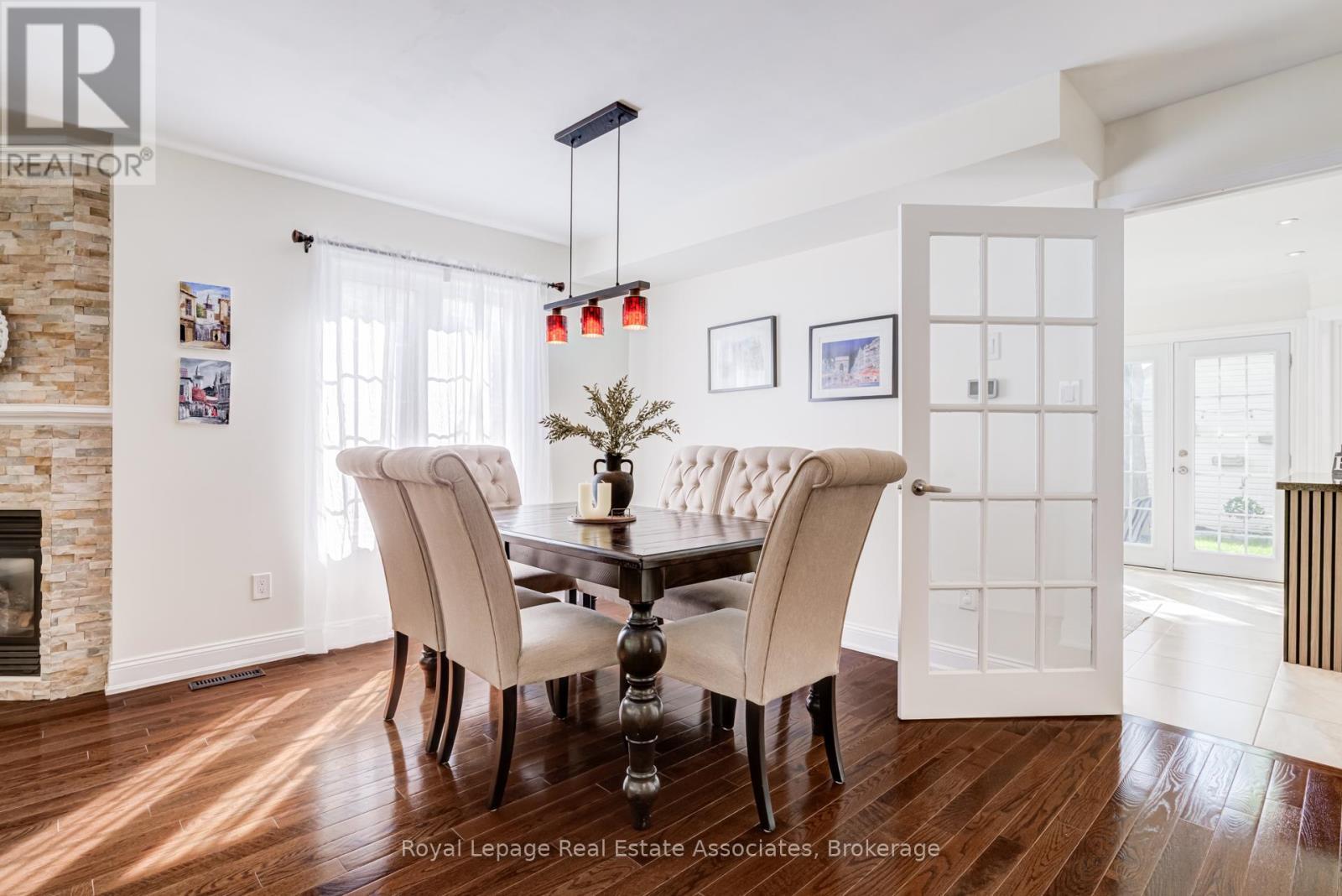 1179 Treetop Terrace, Oakville, ON - Indoor Photo Showing Dining Room With Fireplace