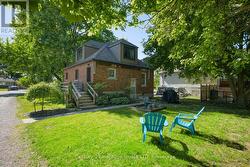 back yard and side porch off kitchen -