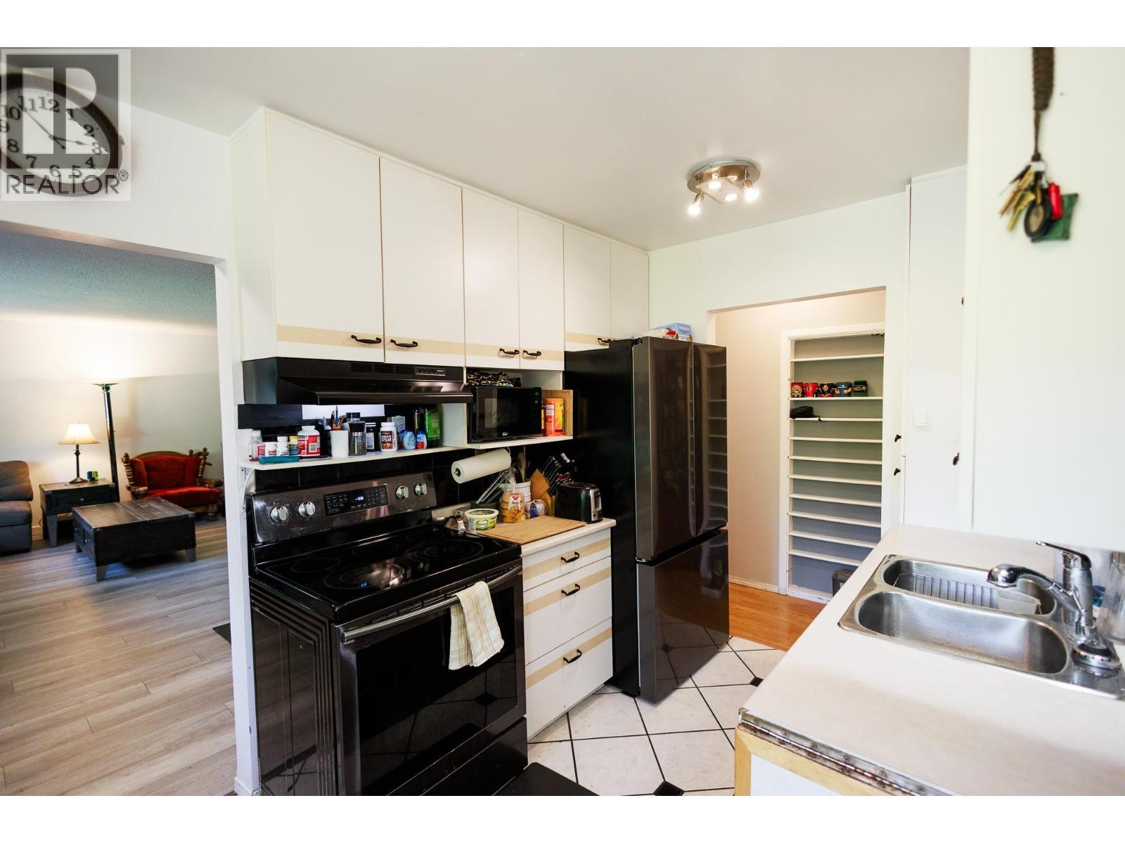4523 Graham Avenue, Terrace, BC - Indoor Photo Showing Kitchen With Double Sink