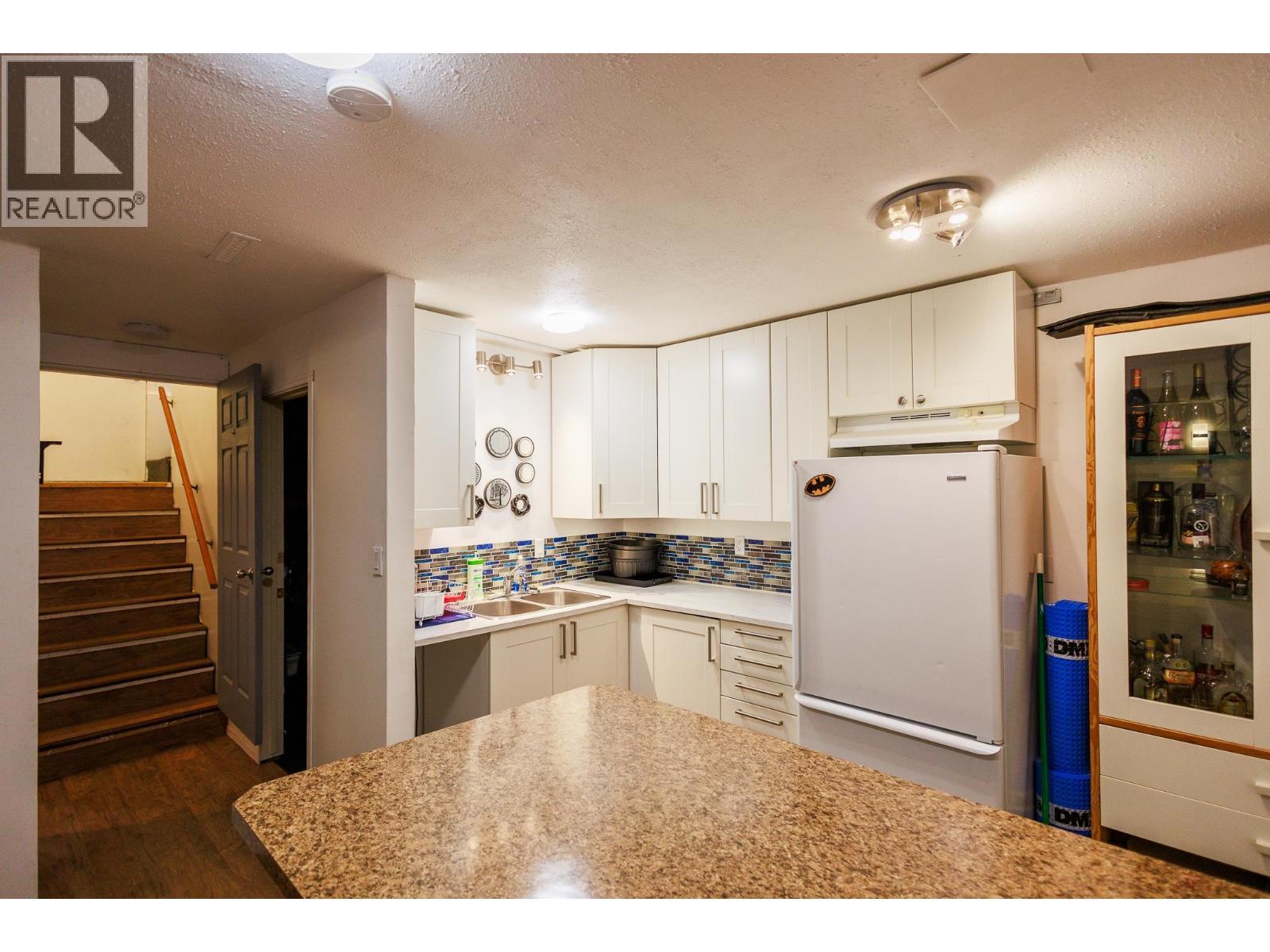 4523 Graham Avenue, Terrace, BC - Indoor Photo Showing Kitchen With Double Sink