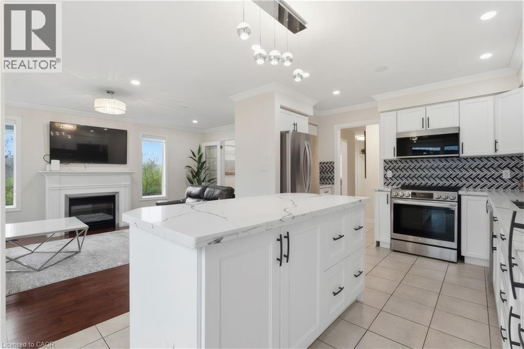 177 Watson Road N, Guelph, ON - Indoor Photo Showing Kitchen With Fireplace With Stainless Steel Kitchen With Upgraded Kitchen