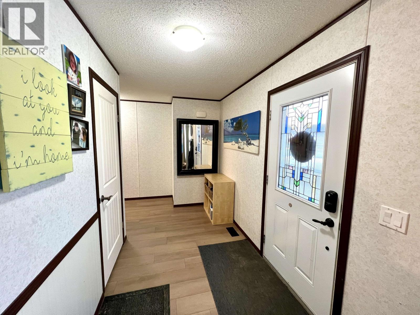 5506 Pine Crescent, Fort Nelson, BC - Indoor Photo Showing Other Room