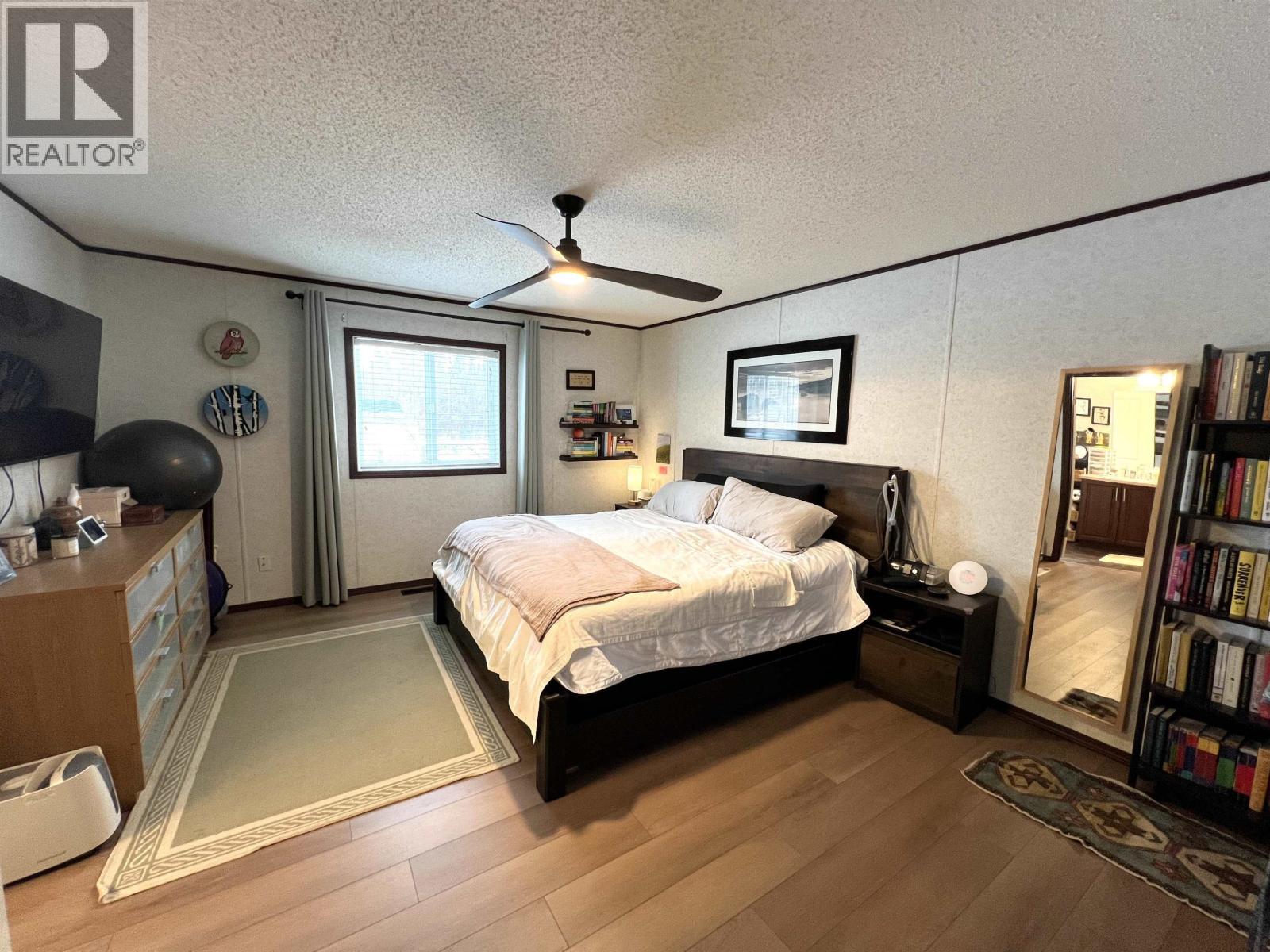 5506 Pine Crescent, Fort Nelson, BC - Indoor Photo Showing Bedroom
