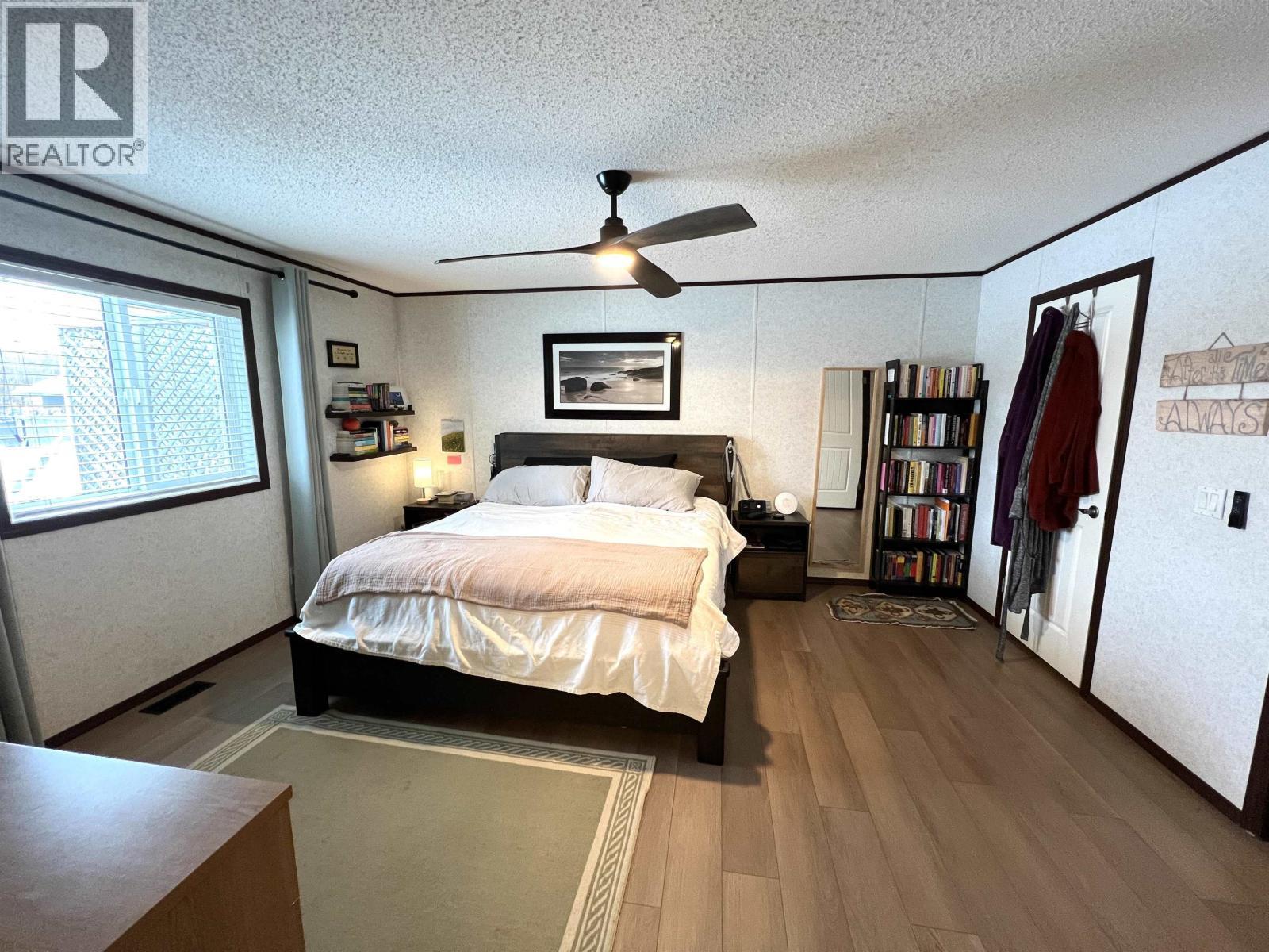 5506 Pine Crescent, Fort Nelson, BC - Indoor Photo Showing Bedroom