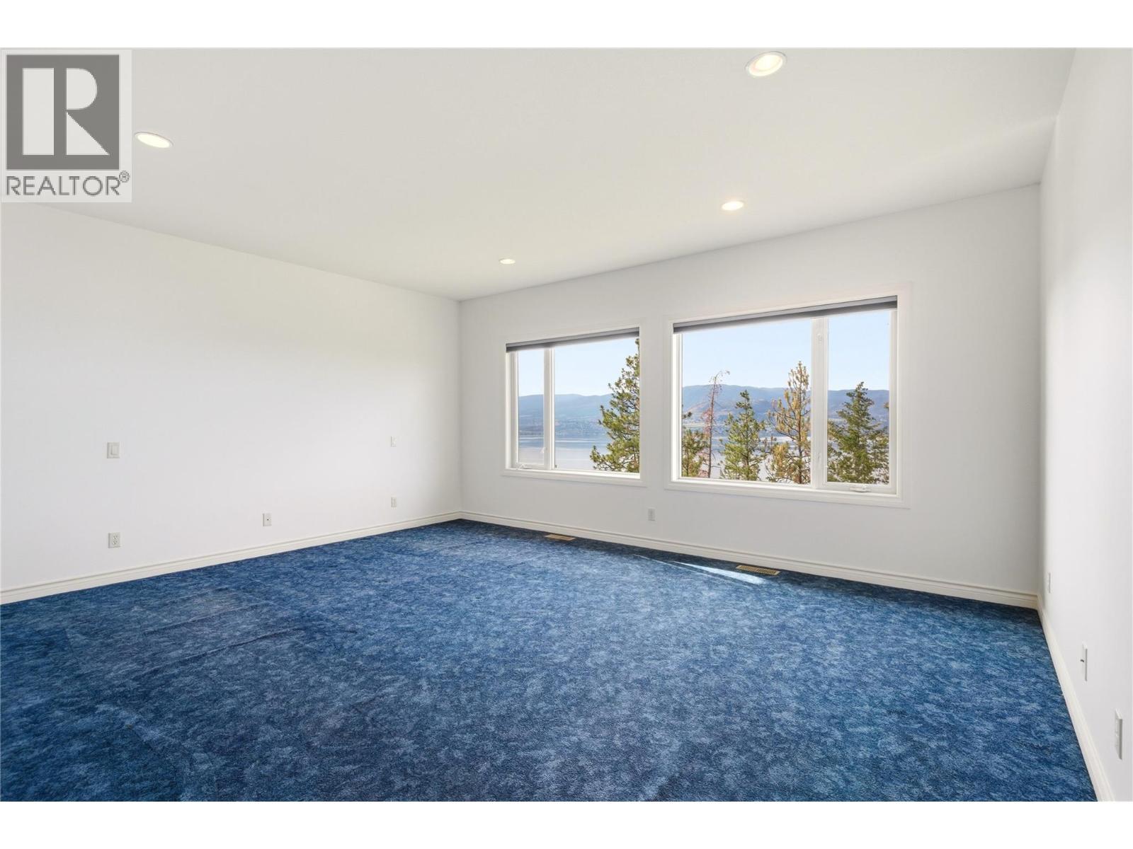 Primary bedroom - 448 Viewcrest Road, Kelowna, BC - Indoor Photo Showing Other Room