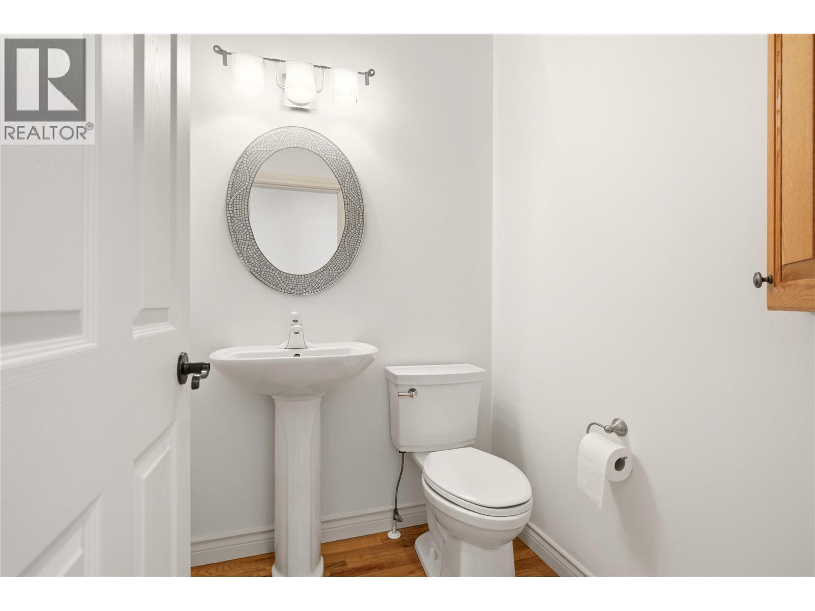 Powder room- main floor - 448 Viewcrest Road, Kelowna, BC - Indoor Photo Showing Bathroom