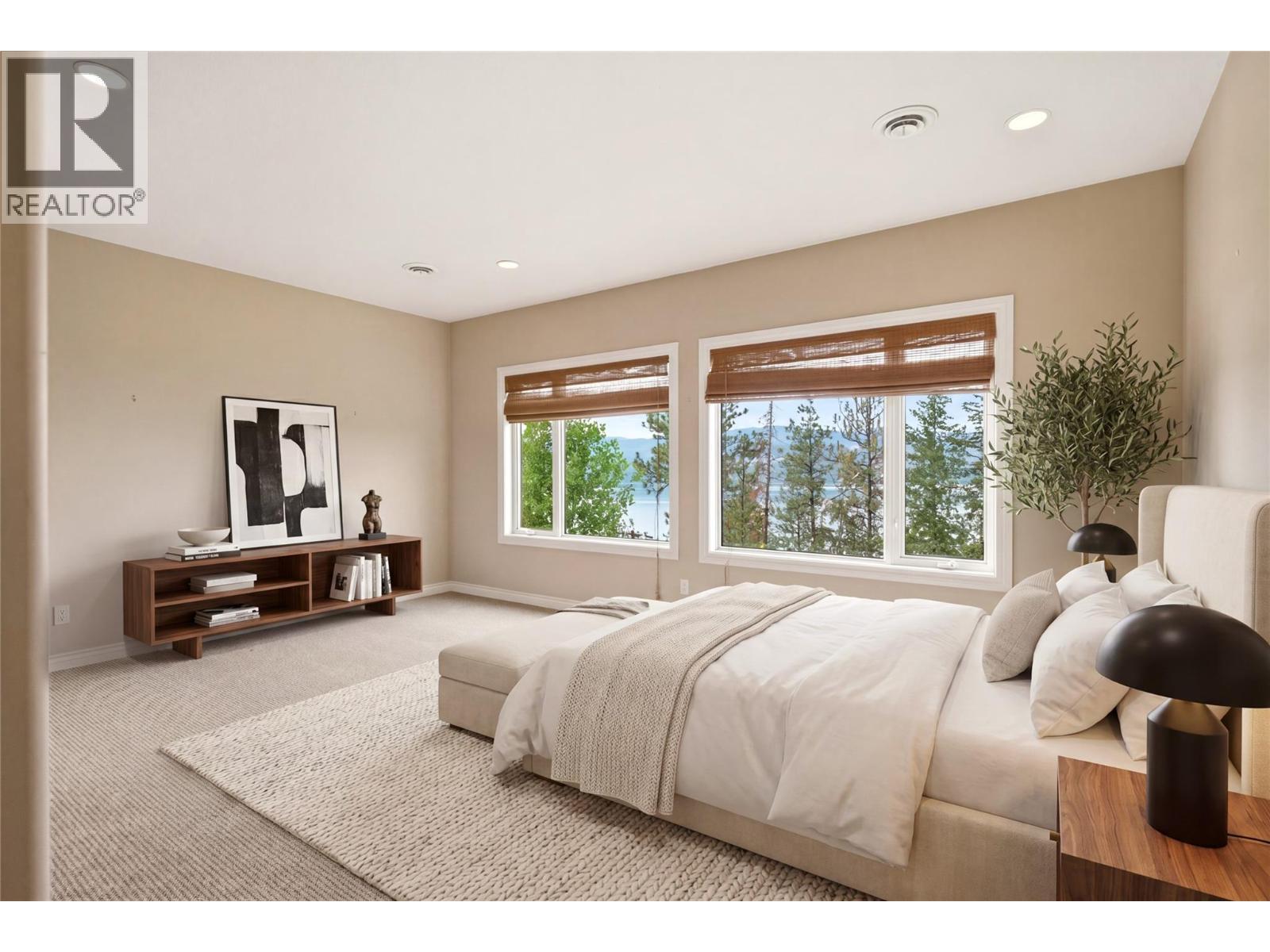 Lower level bedroom 1- virtually staged with furniture - 448 Viewcrest Road, Kelowna, BC - Indoor Photo Showing Bedroom