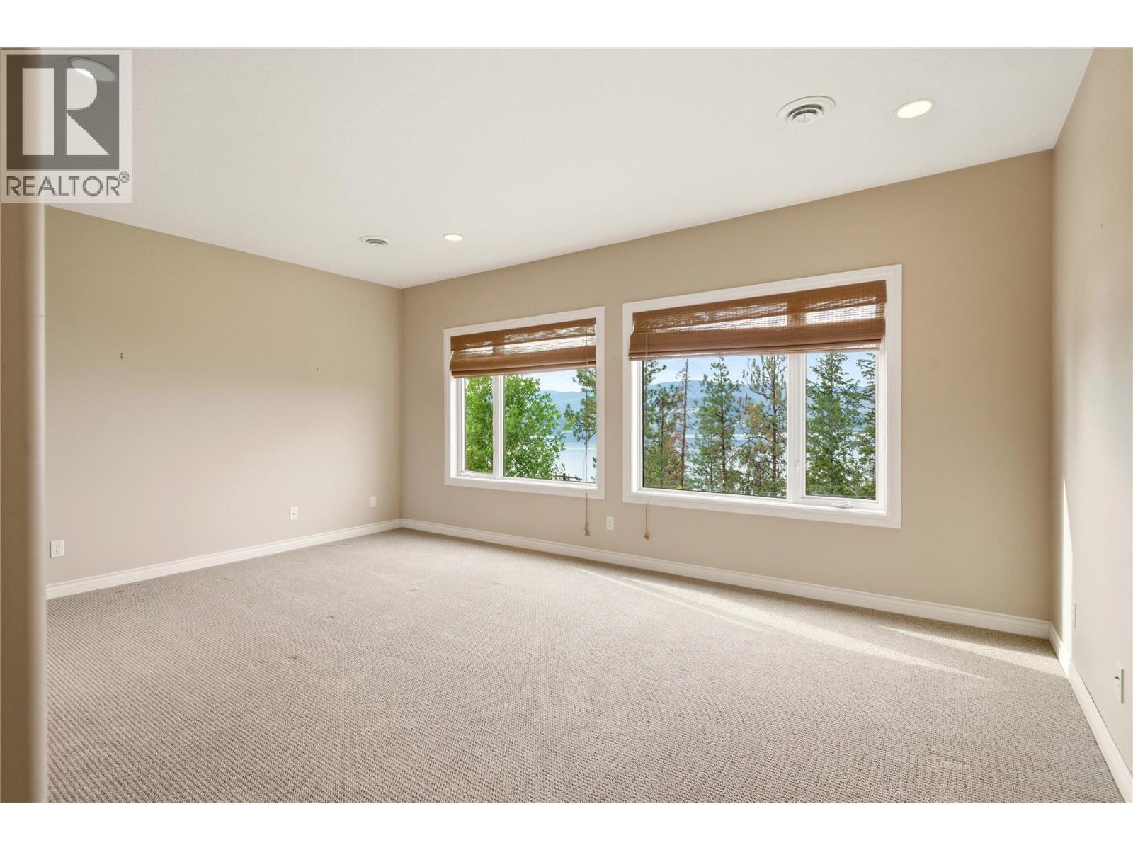 lower level bedroom 1 - 448 Viewcrest Road, Kelowna, BC - Indoor Photo Showing Other Room