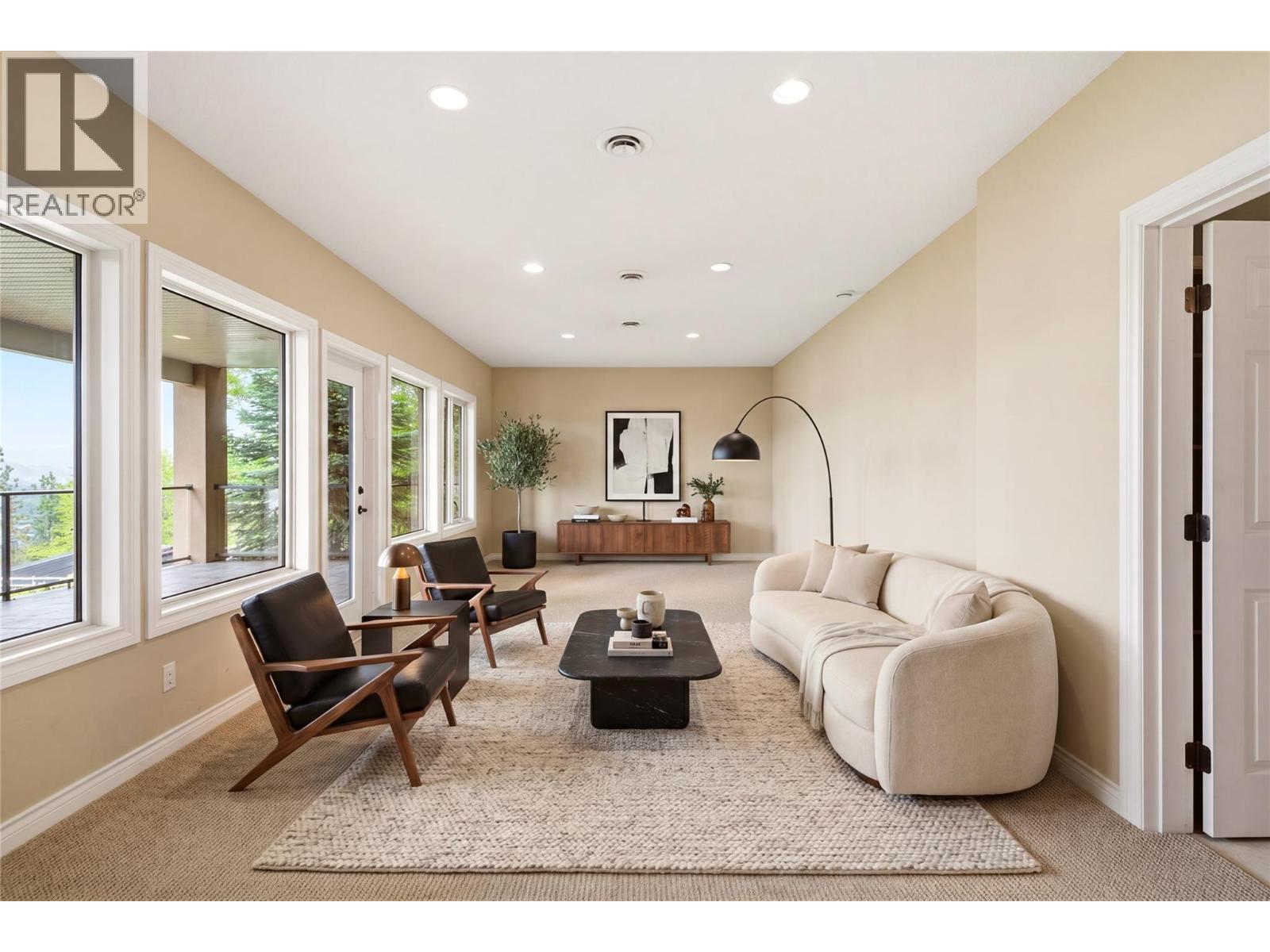 Lower level den-virtually staged with furniture - 448 Viewcrest Road, Kelowna, BC - Indoor