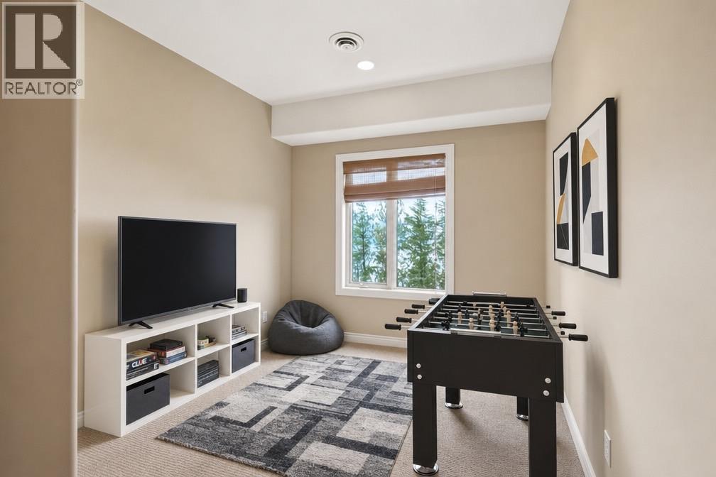 Bedroom 4 - virtually staged as a games room - 448 Viewcrest Road, Kelowna, BC - Indoor
