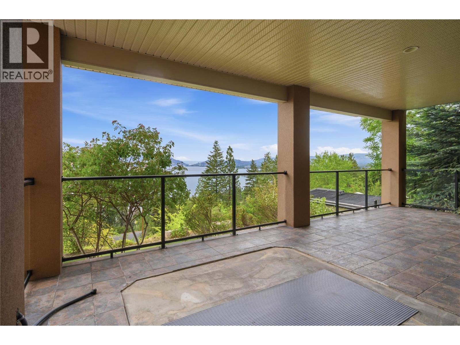 Lower level covered balcony - 448 Viewcrest Road, Kelowna, BC - Outdoor With Balcony With Exterior