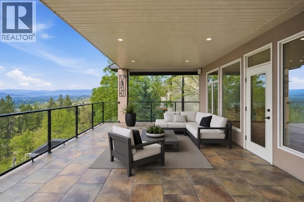 Virtually staged furniture on the main floor balcony - 448 Viewcrest Road, Kelowna, BC - Outdoor With Deck Patio Veranda With Exterior