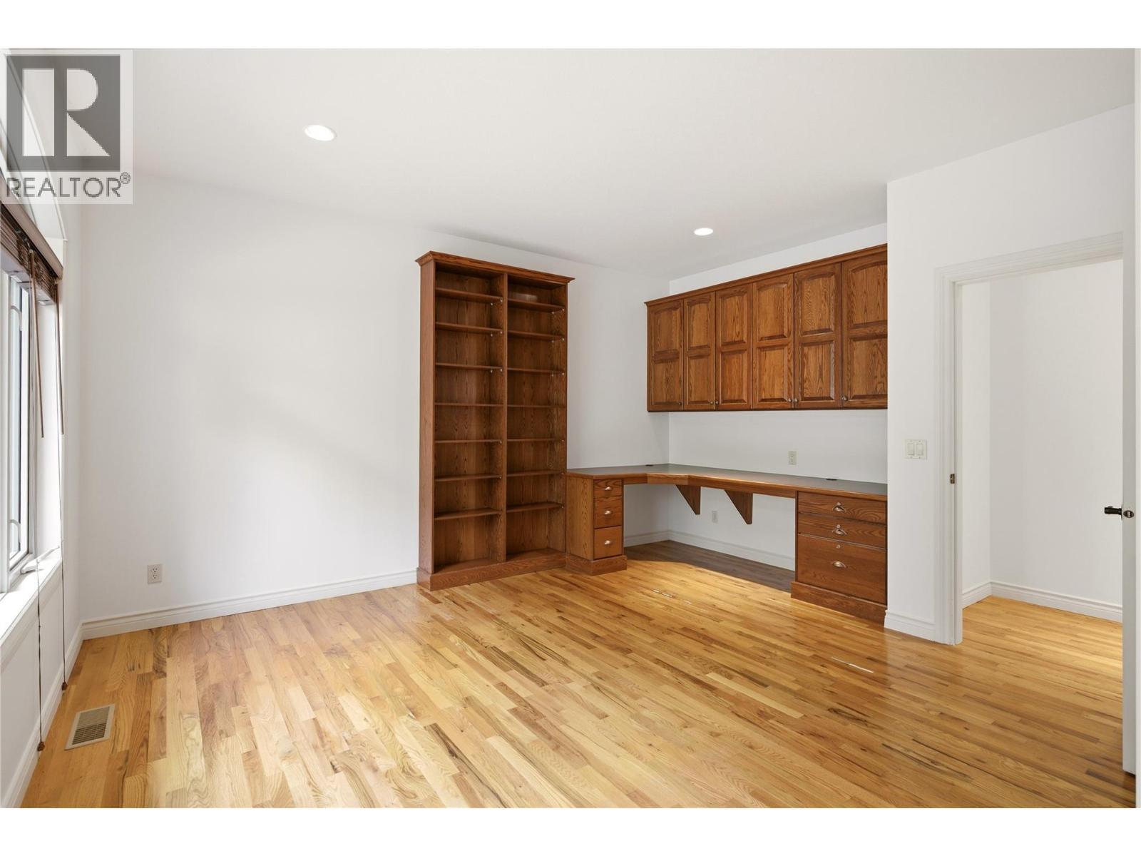 Den with custom cabinetry - 448 Viewcrest Road, Kelowna, BC - Indoor Photo Showing Other Room