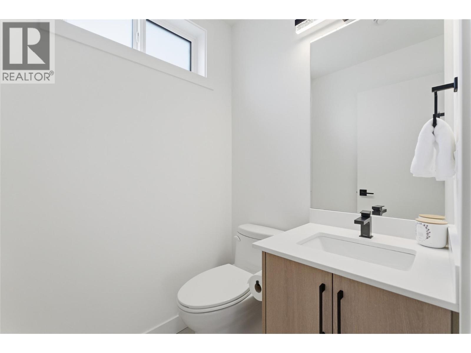 Half Bath on the Main/Second Floor - 4601 97 Street Unit# 6, Osoyoos, BC - Indoor Photo Showing Bathroom