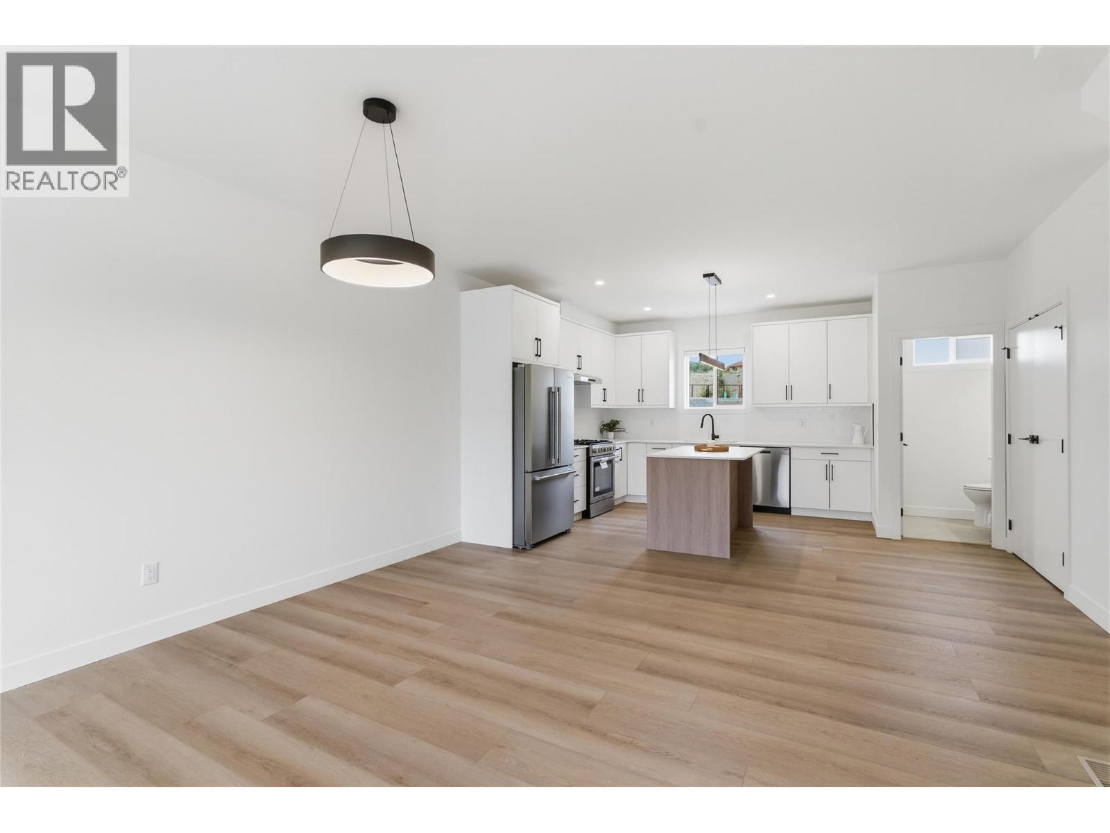 Open concept kitchen, dining, and living area - 4601 97 Street Unit# 6, Osoyoos, BC - Indoor Photo Showing Kitchen