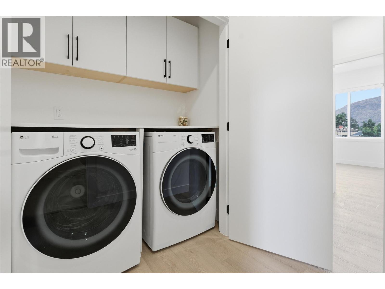 Laundry room on the same level as bedrooms for everyday convenience - 4601 97 Street Unit# 6, Osoyoos, BC - Indoor Photo Showing Laundry Room