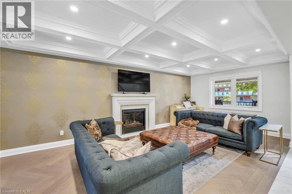 Coffered ceiling with recessed lighting - 25 Park Street E, Hamilton, ON - Indoor Photo Showing Living Room With Fireplace