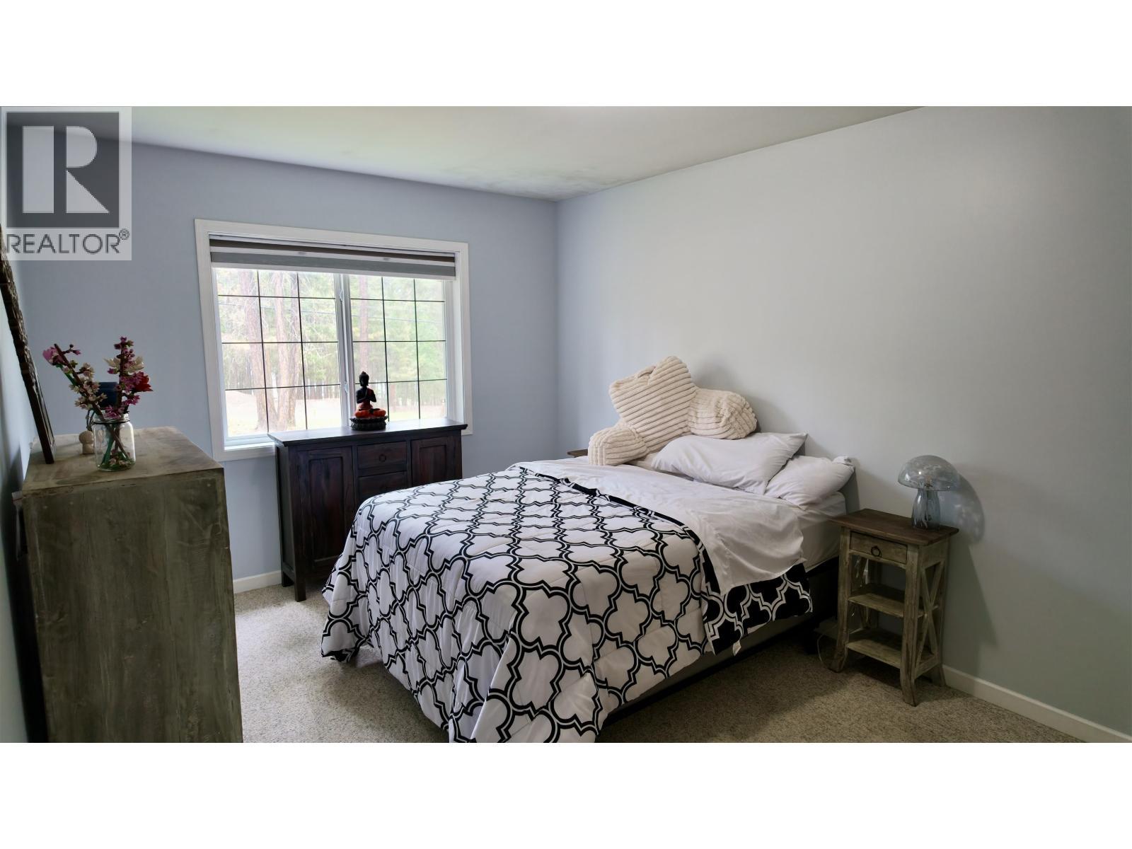 4838 Kitwanga Drive, 108 Mile Ranch, BC - Indoor Photo Showing Bedroom
