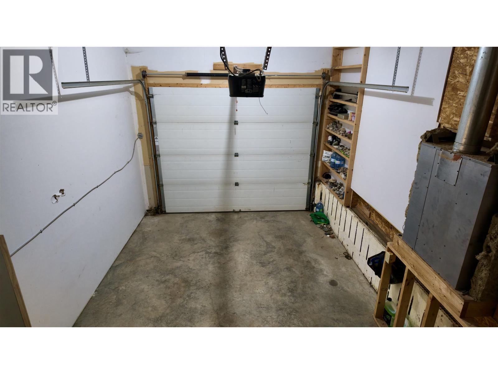 4838 Kitwanga Drive, 108 Mile Ranch, BC - Indoor Photo Showing Garage
