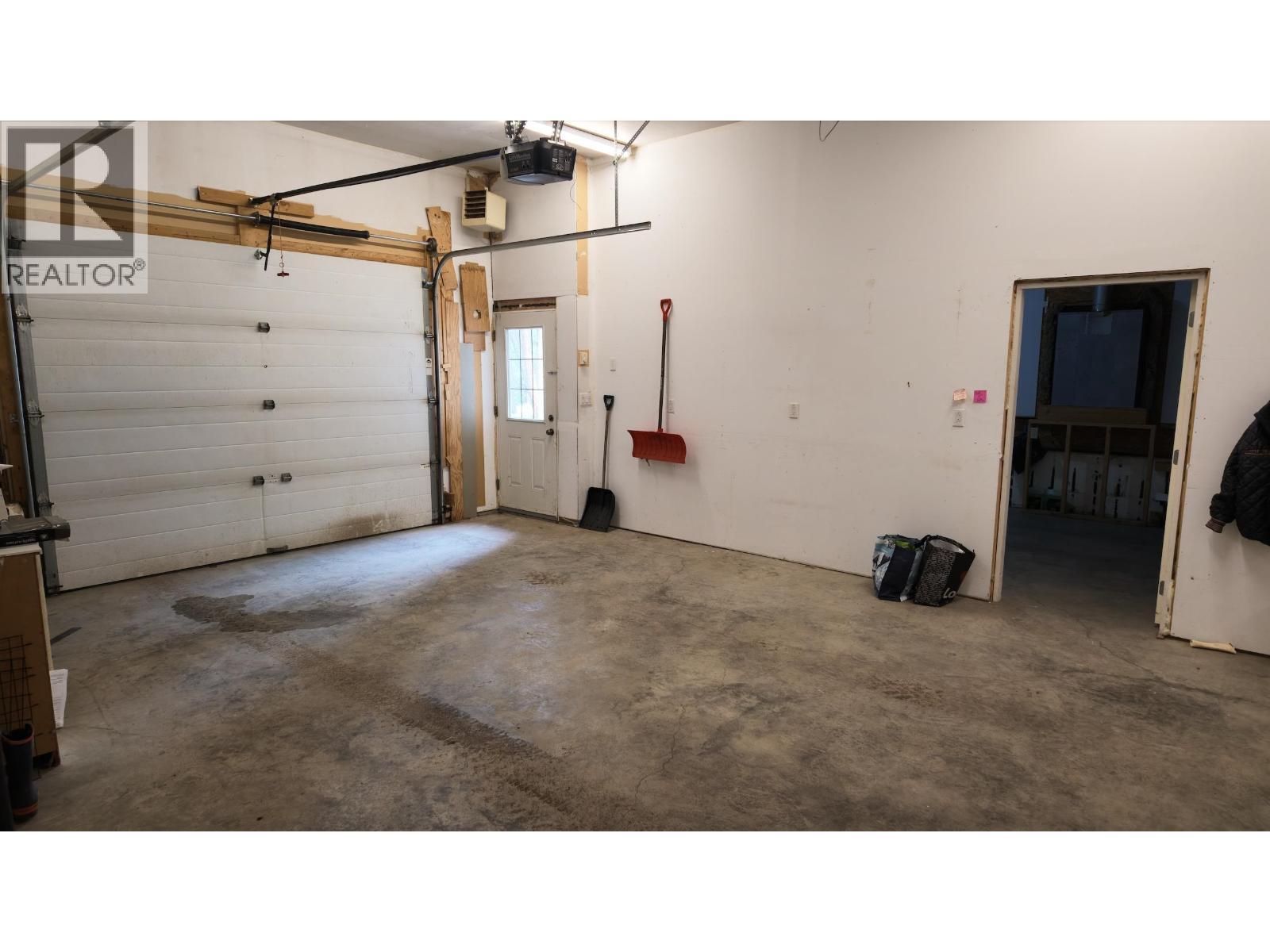4838 Kitwanga Drive, 108 Mile Ranch, BC - Indoor Photo Showing Garage