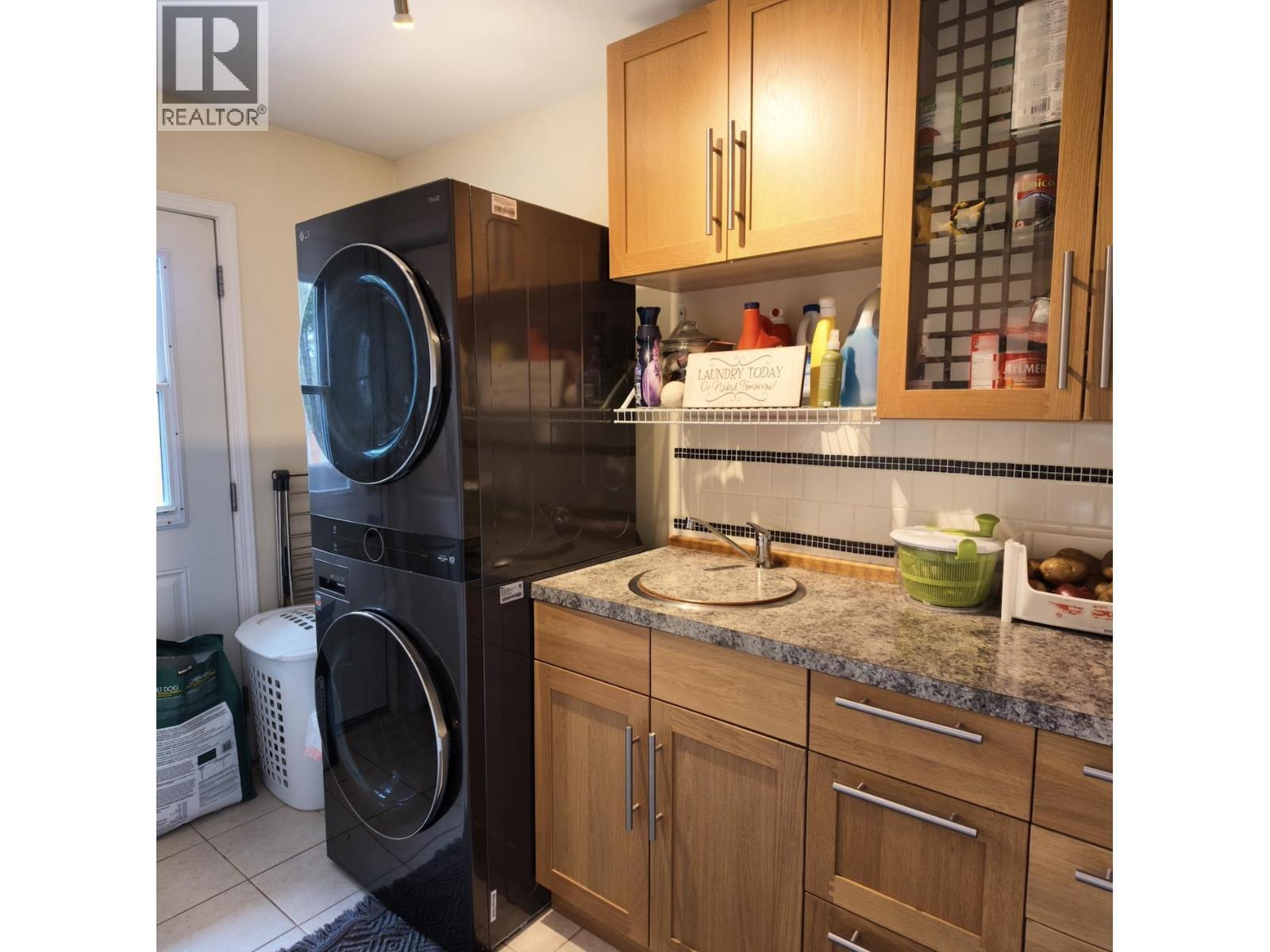 4838 Kitwanga Drive, 108 Mile Ranch, BC - Indoor Photo Showing Laundry Room