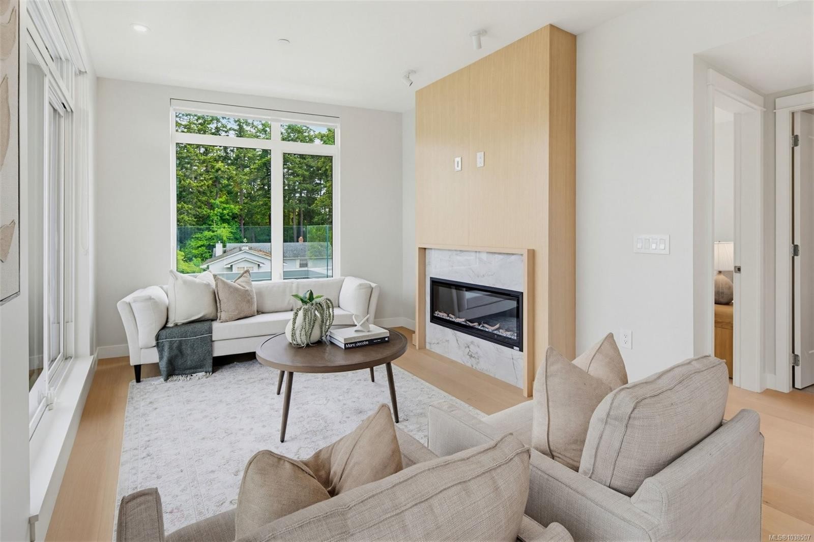 #Ph 403-5229 Cordova Bay Rd, Saanich, BC - Indoor Photo Showing Living Room With Fireplace