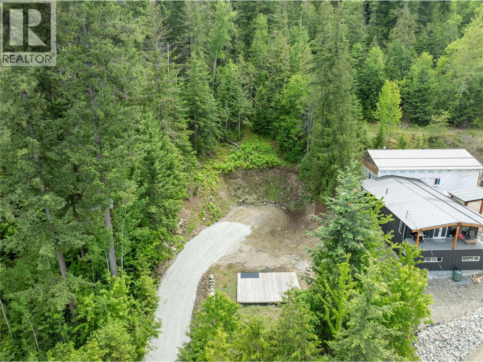 cleared building area with septic and well already in place. - 3950 Short Road, Eagle Bay, BC