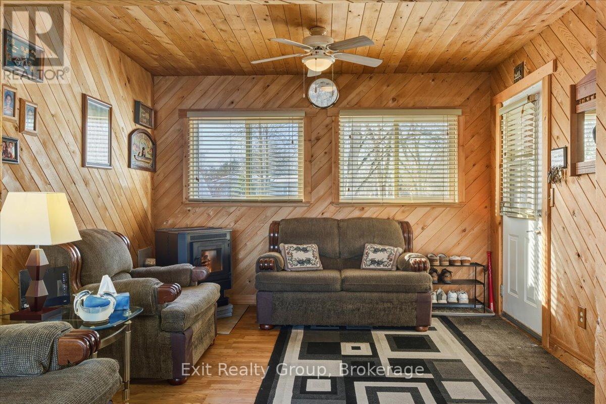 33 Willow Point Road, Brighton, ON - Indoor Photo Showing Living Room With Fireplace