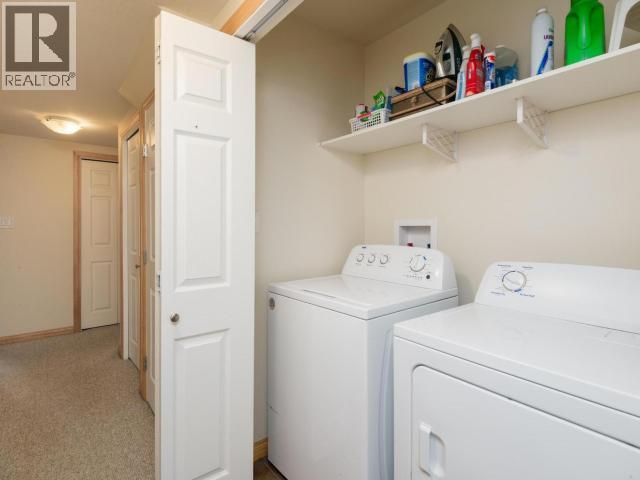 15 Bailey Place, Whitehorse, YT - Indoor Photo Showing Laundry Room