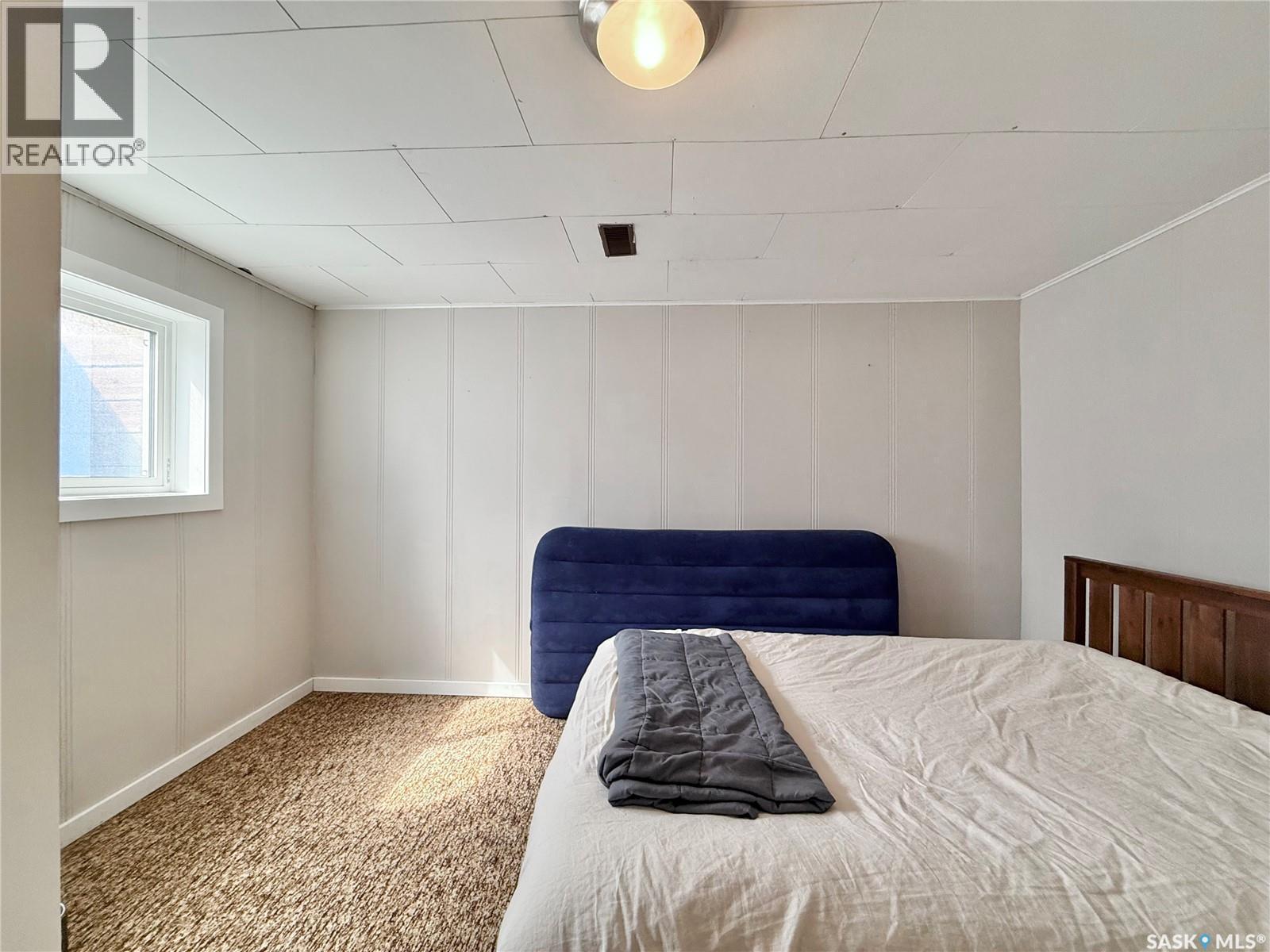 211 Pangman Street, Outlook, SK - Indoor Photo Showing Bedroom