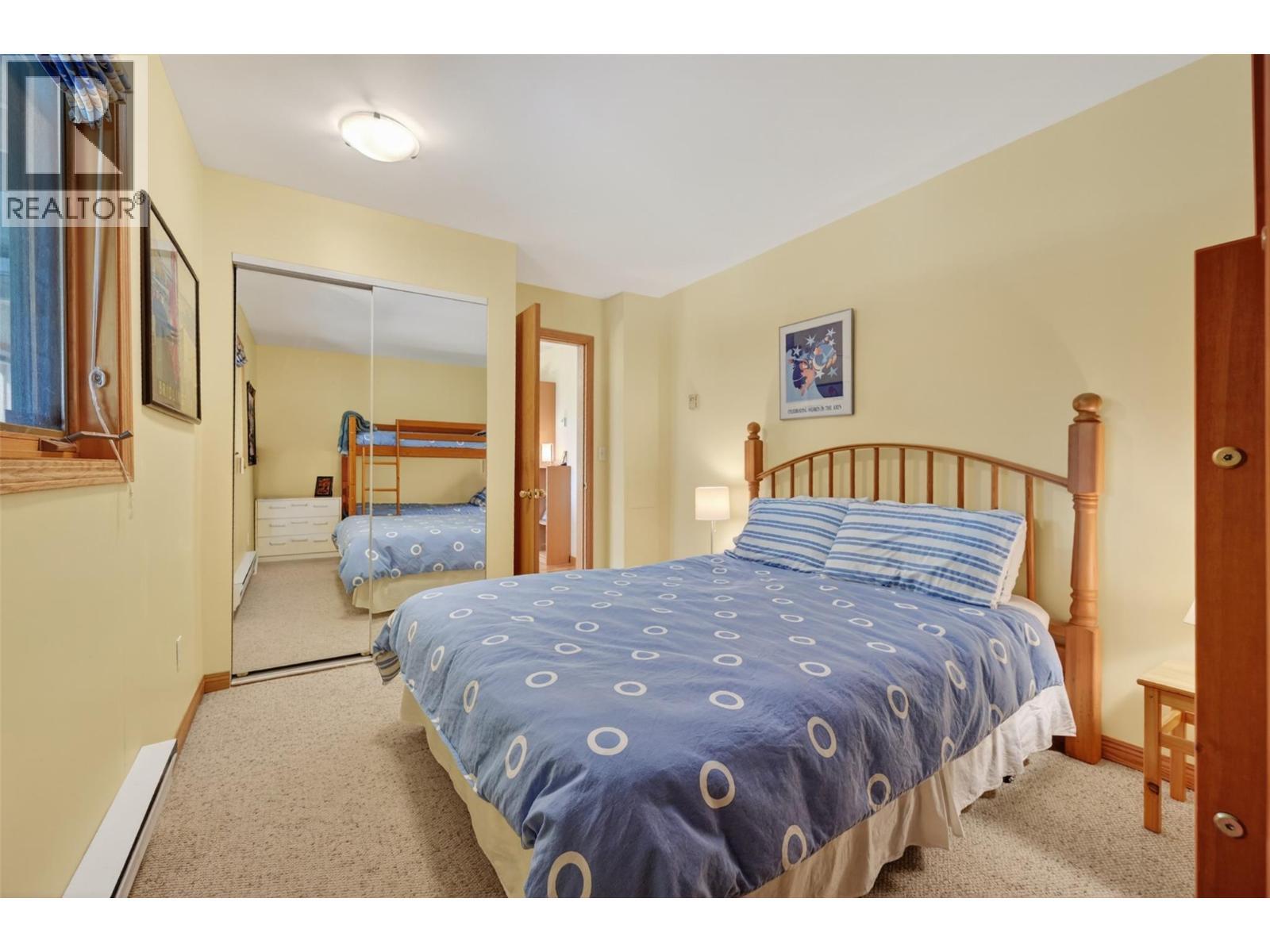 1067 Timberhill Place, Windermere, BC - Indoor Photo Showing Bedroom
