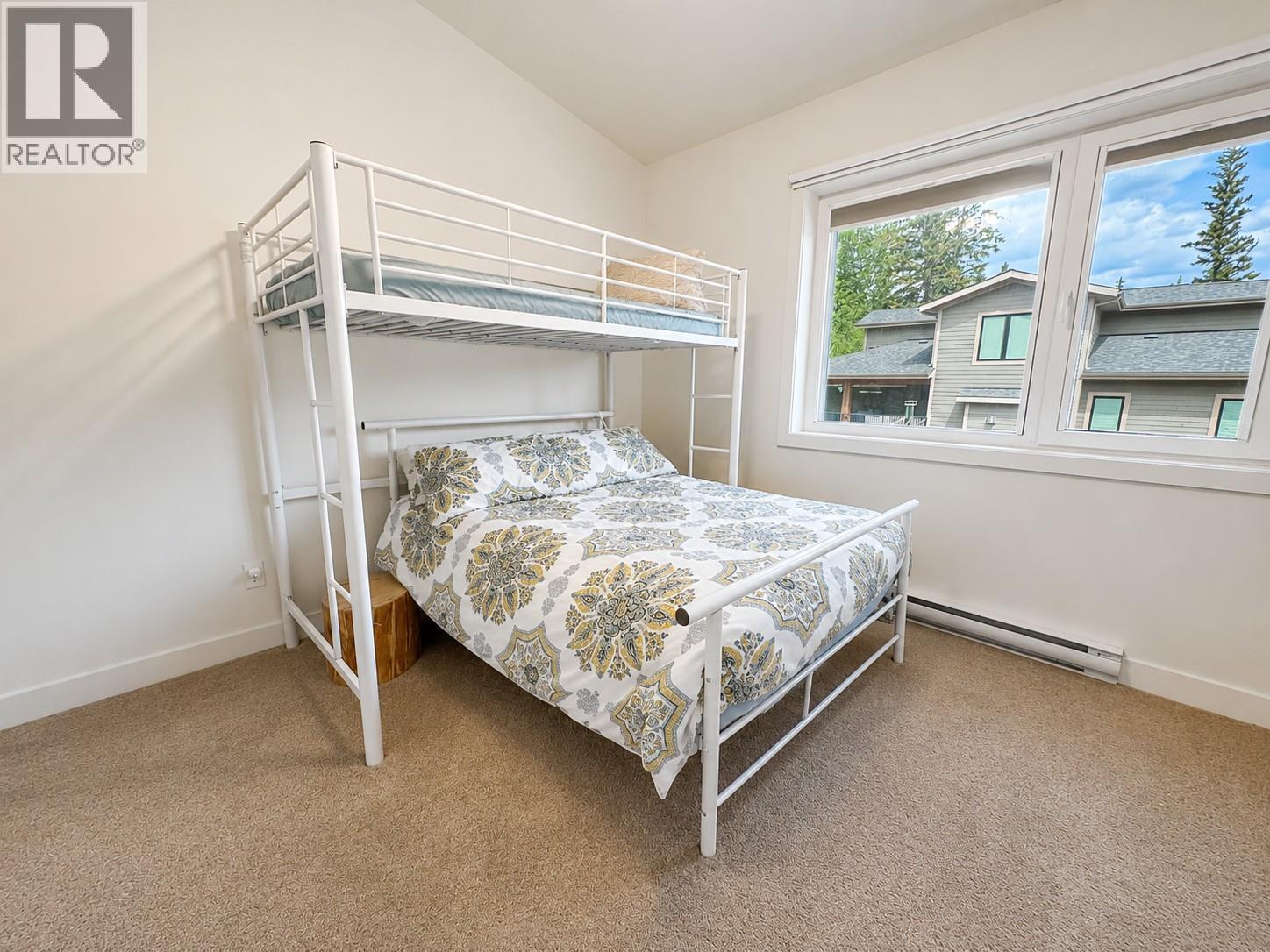 4615 Rowan Street, Windermere, BC - Indoor Photo Showing Bedroom