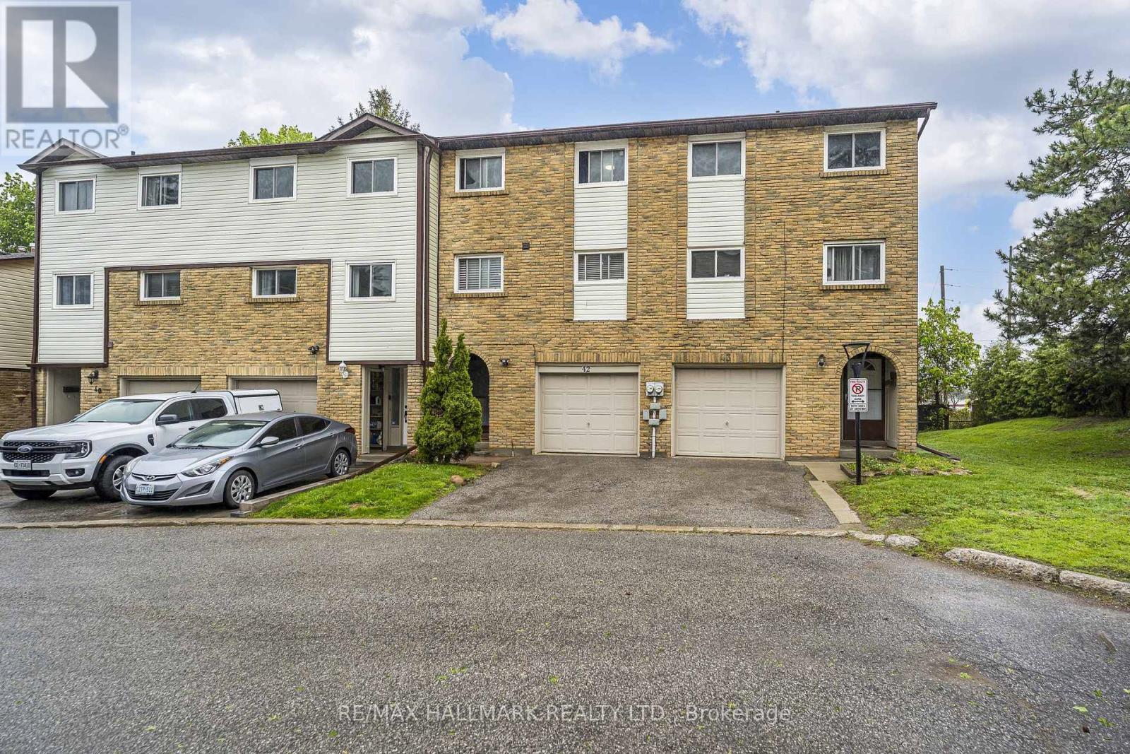 42 - 1330 Trowbridge Drive, Oshawa, ON - Outdoor With Facade