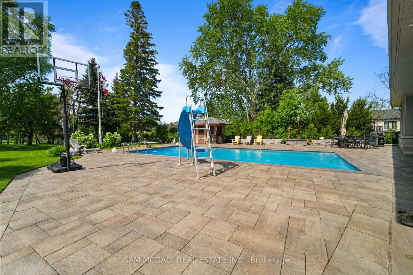 2411 Thorn Lodge Drive, Mississauga, ON - Outdoor With In Ground Pool