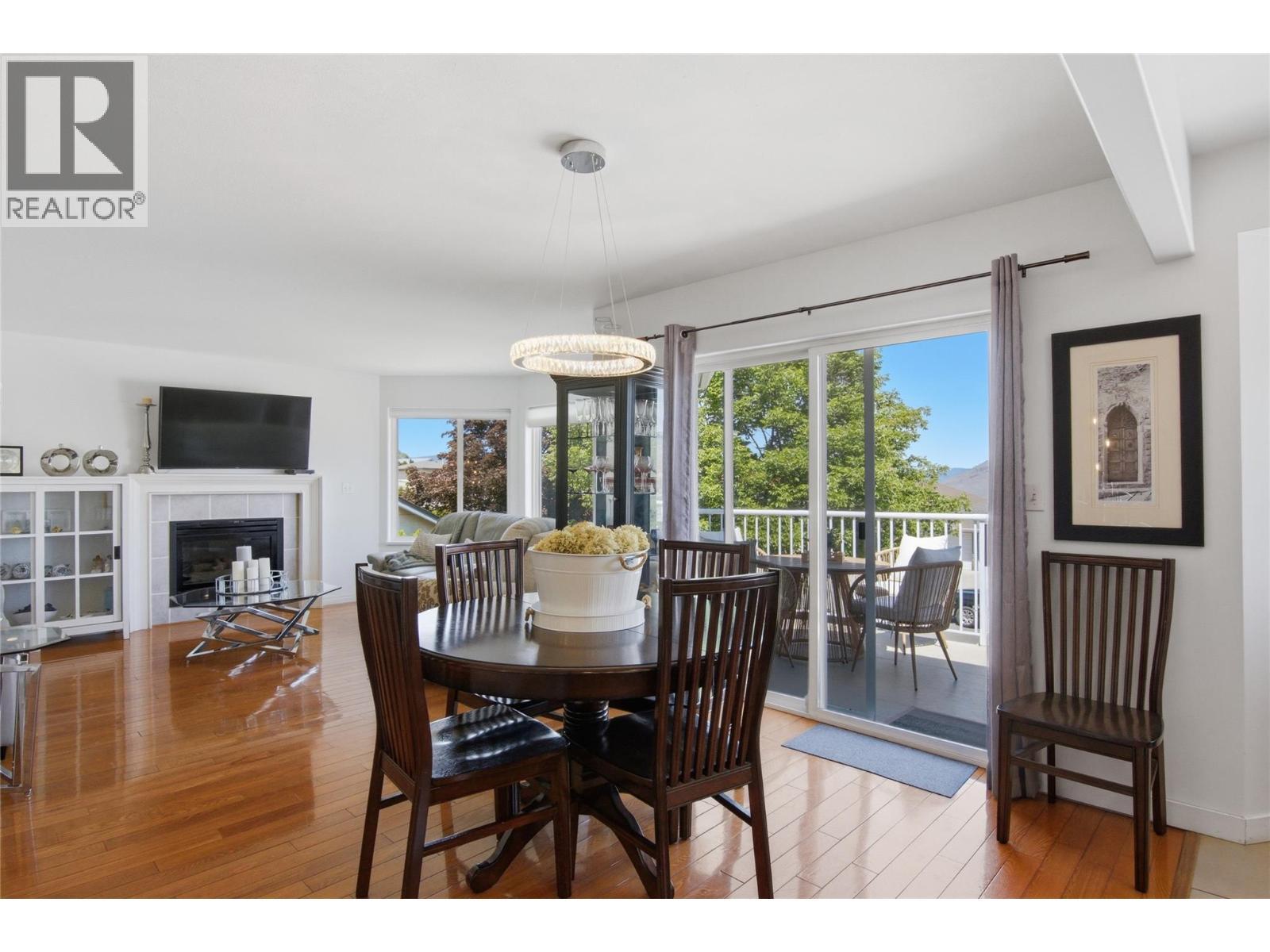 87 Thor Drive, Kamloops, BC - Indoor Photo Showing Dining Room With Fireplace