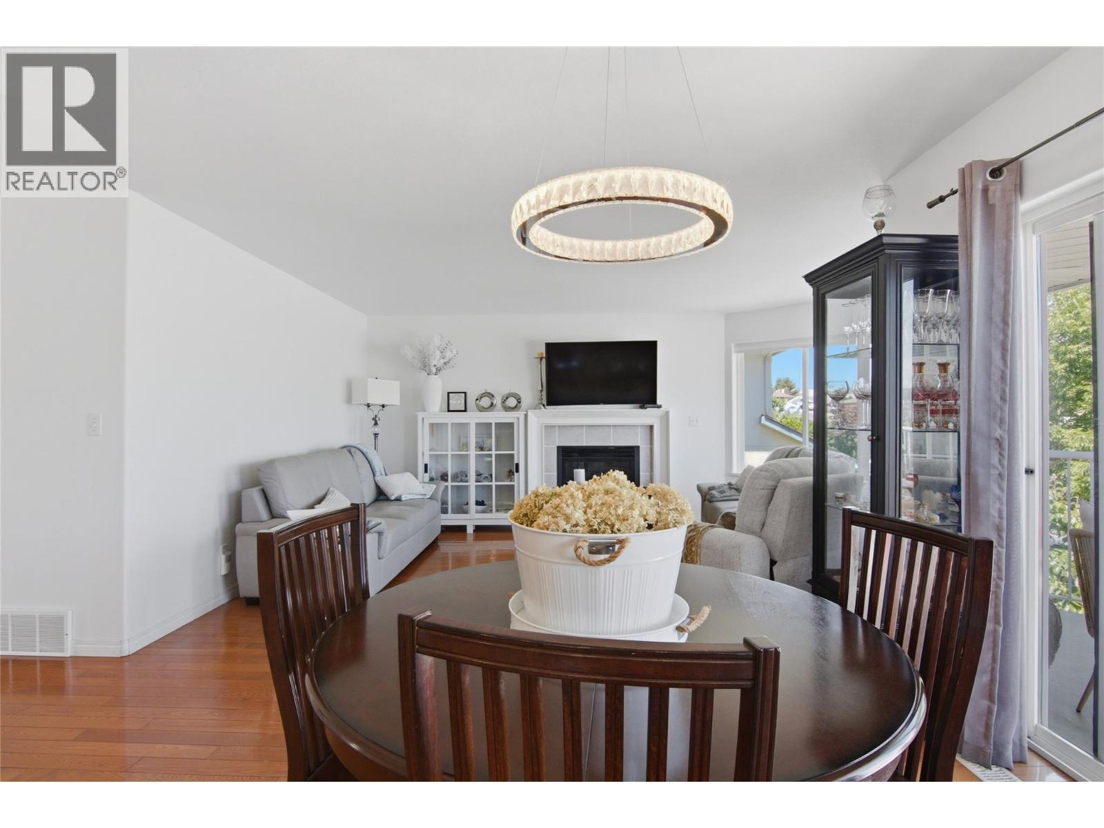 87 Thor Drive, Kamloops, BC - Indoor Photo Showing Dining Room With Fireplace