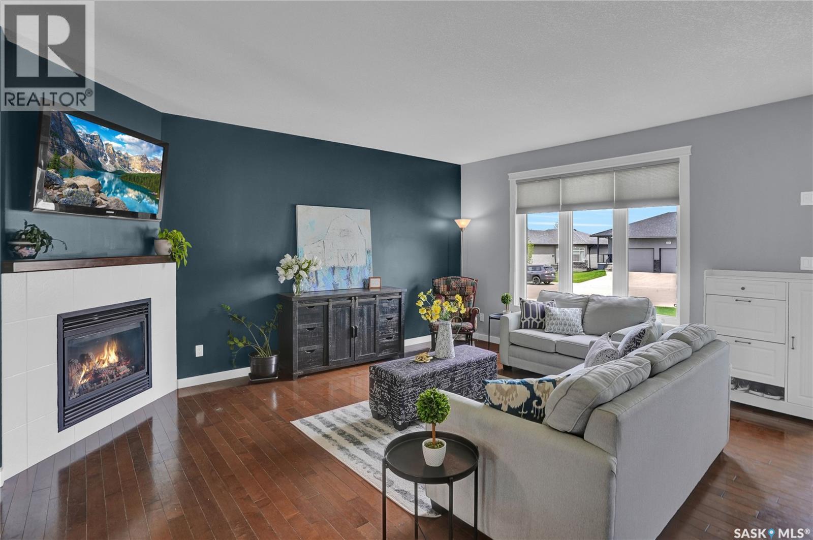 121 Everton Crescent, Moose Jaw, SK - Indoor Photo Showing Living Room With Fireplace