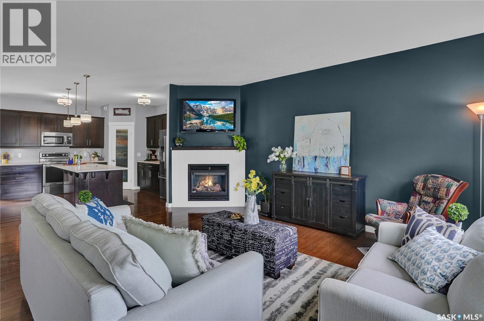 121 Everton Crescent, Moose Jaw, SK - Indoor Photo Showing Living Room With Fireplace