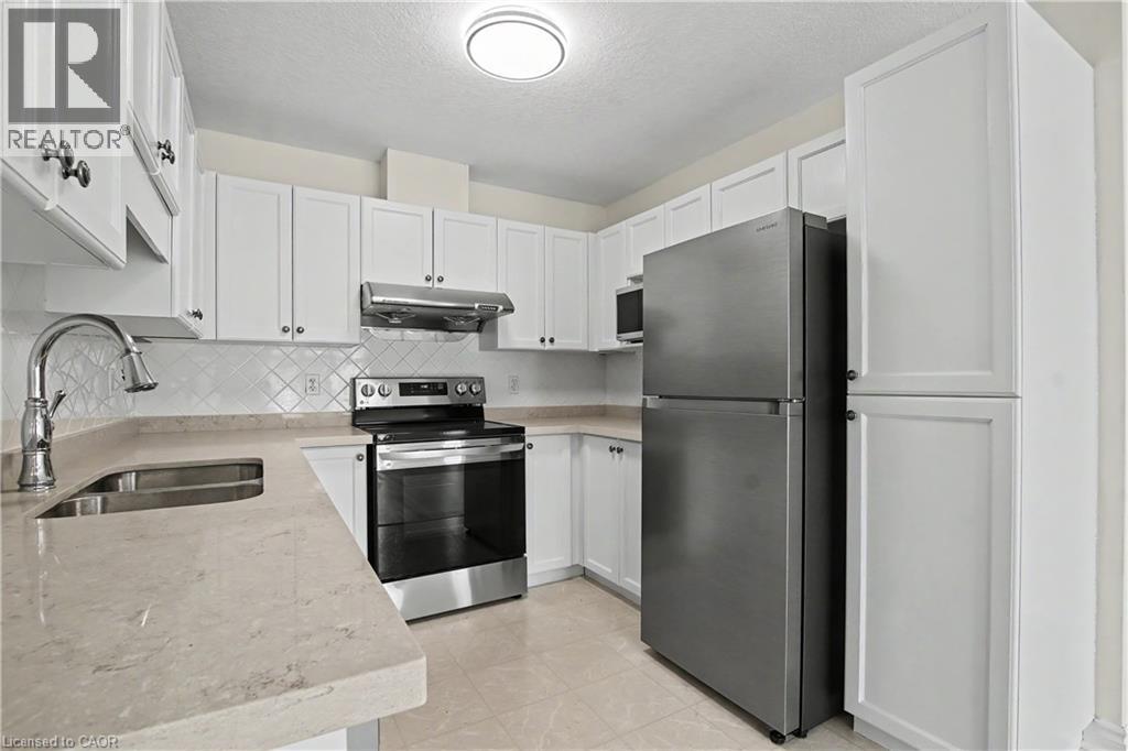 619 Wild Ginger Avenue Unit# C15 & #C16, Waterloo, ON - Indoor Photo Showing Kitchen With Double Sink