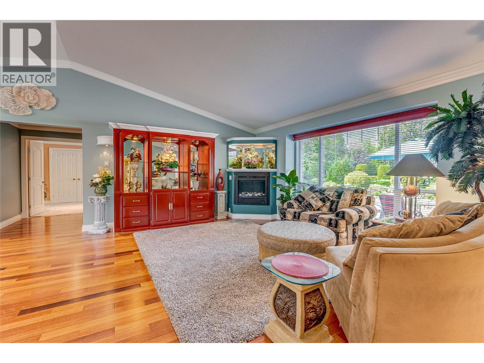 39 Ladyslipper Road, Lumby, BC - Indoor Photo Showing Living Room With Fireplace