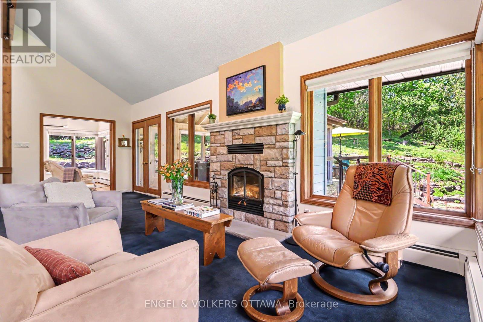 4637 Northwoods Drive, Ottawa, ON - Indoor Photo Showing Living Room With Fireplace