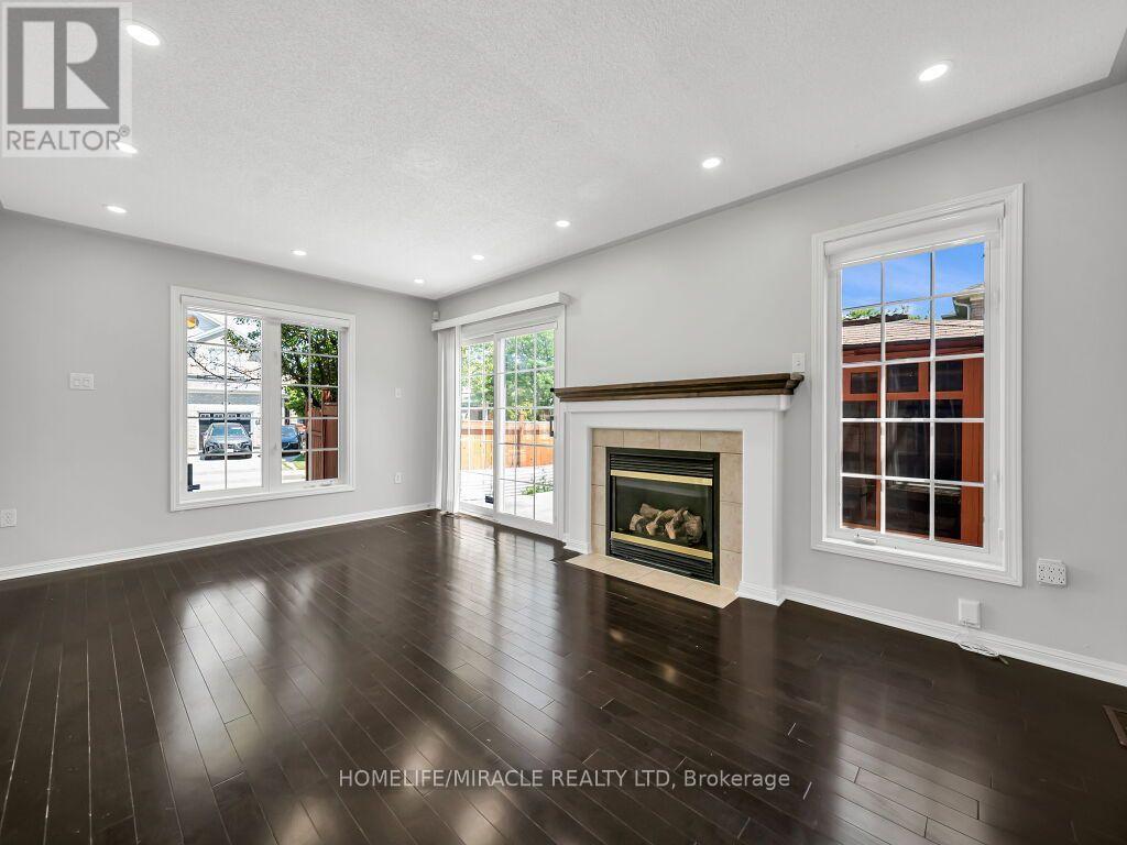55 Secord Crescent, Brampton, ON - Indoor Photo Showing Living Room With Fireplace
