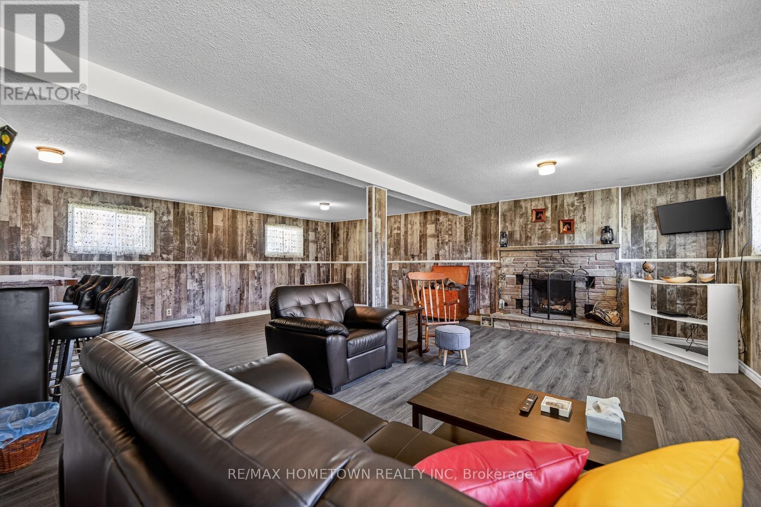 Lower level rec room - 4523 Kilkenny Road, Elizabethtown-Kitley, ON - Indoor Photo Showing Living Room With Fireplace
