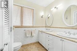 Double sinks & heated flr in main bath -
