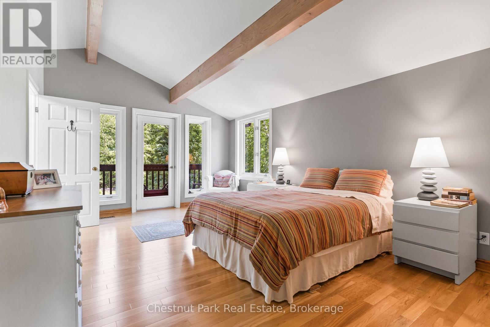 PRIMARY SUITE WITH BALCONY - 600380 Sideroad 50 N, Chatsworth, ON - Indoor Photo Showing Bedroom