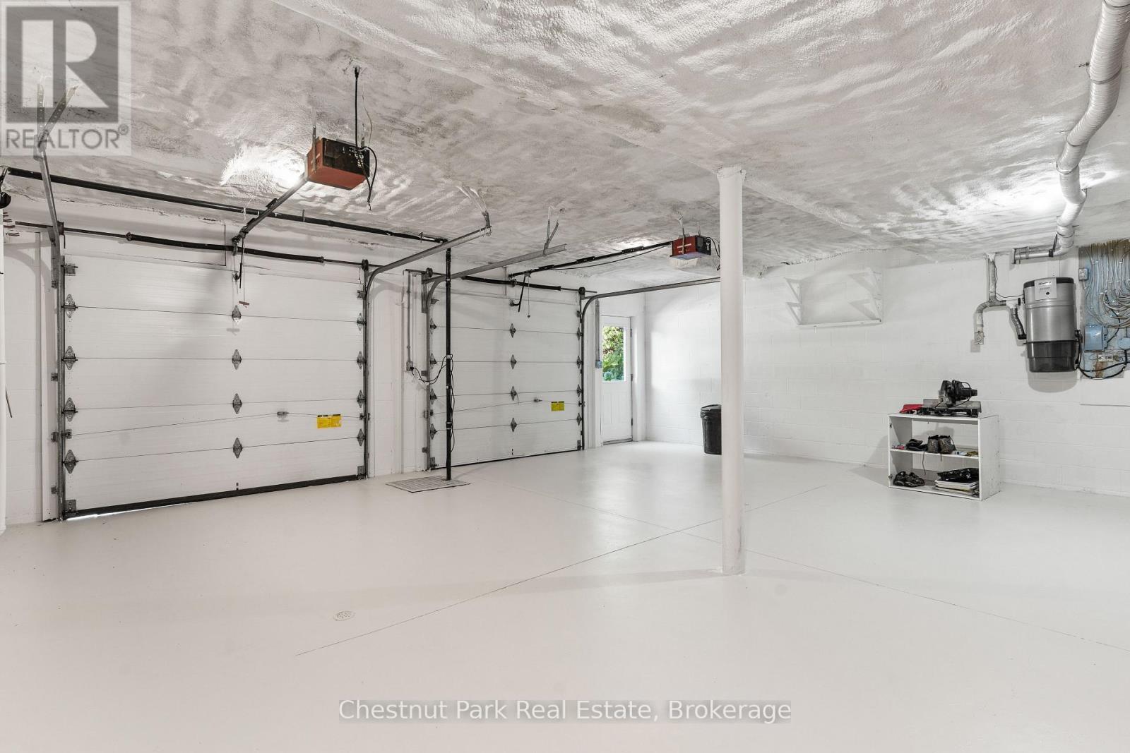 INSIDE DOUBLE CAR ATTACHED GARAGE - 600380 Sideroad 50 N, Chatsworth, ON - Indoor Photo Showing Garage