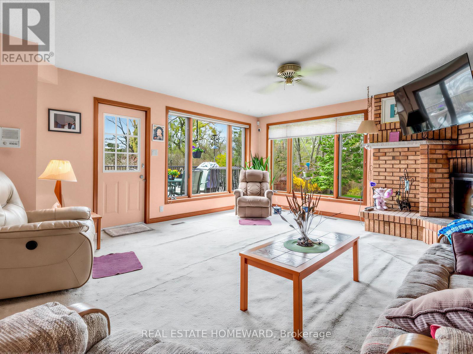 38 Centennial Road, Toronto, ON - Indoor Photo Showing Living Room With Fireplace