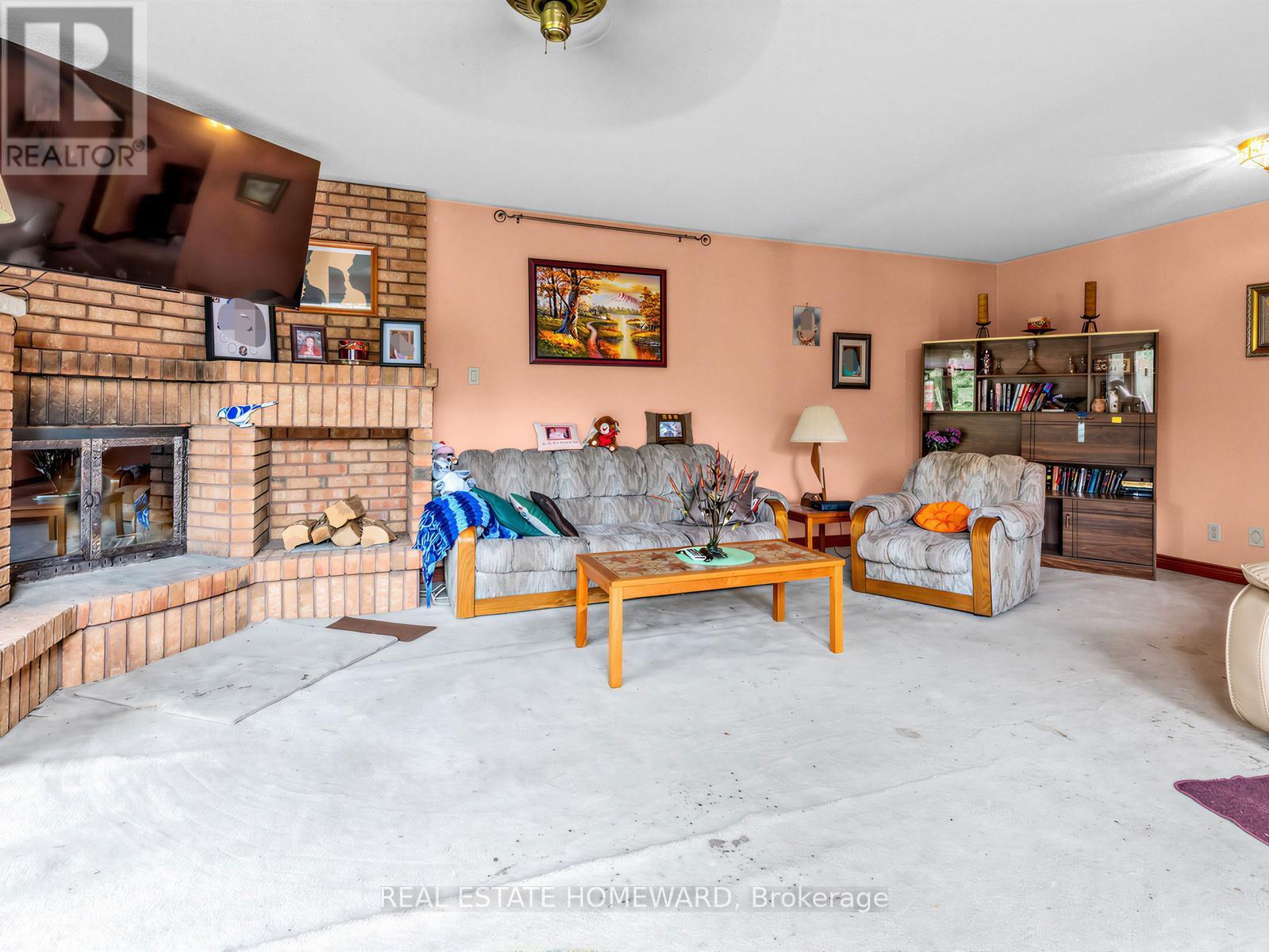 38 Centennial Road, Toronto, ON - Indoor Photo Showing Living Room With Fireplace